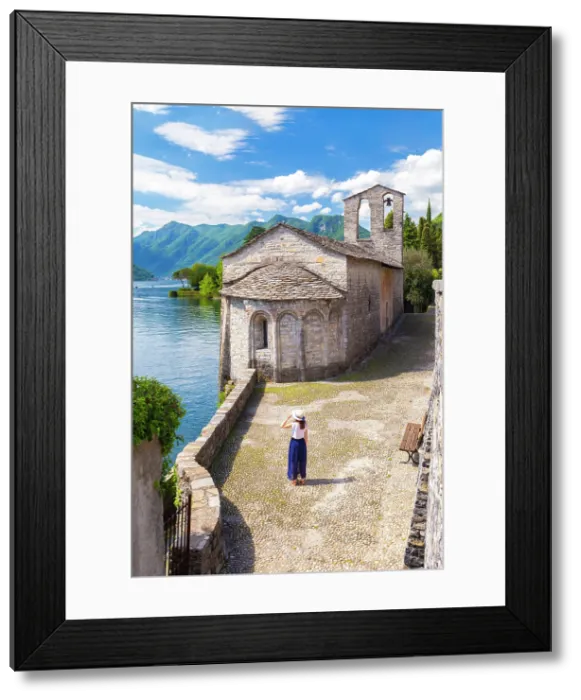 Framed Print : A girl admiring Chiesa di San Giacomo and Isola Comacina. Ossuccio, Tremezzina, Como Lake, Lombardy, Italy. (MR) Framed Print : A girl admiring Chiesa di San Giacomo and Isola Comacina. Ossuccio, Tremezzina, Como Lake, Lombardy, Italy. (MR)