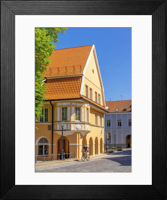 Framed Print : Cyclist infront of Traditional Buildings, Klaipeda, Lithuania