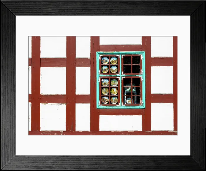 Framed Print : Decorative Plates in a Window in a Fachwerk Styled Traditional Building, Klaipeda, Lithuania Framed Print : Decorative Plates in a Window in a Fachwerk Styled Traditional Building, Klaipeda, Lithuania