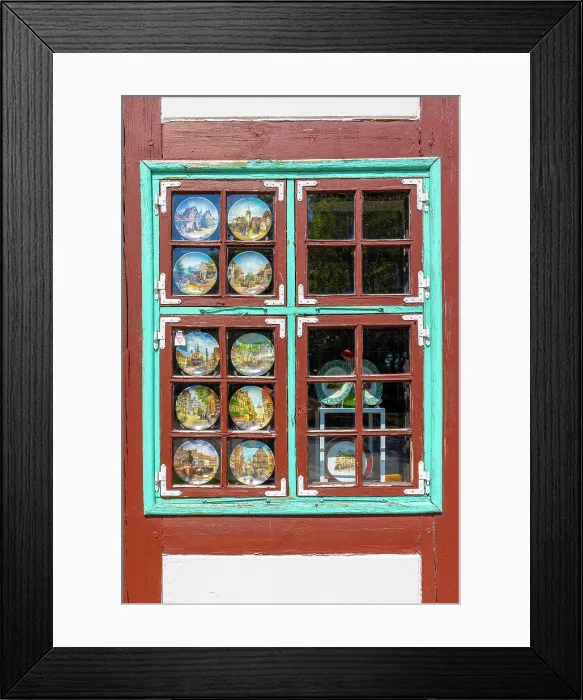 Framed Print : Decorative Plates in a Window in a Fachwerk Styled Traditional Building, Klaipeda, Lithuania