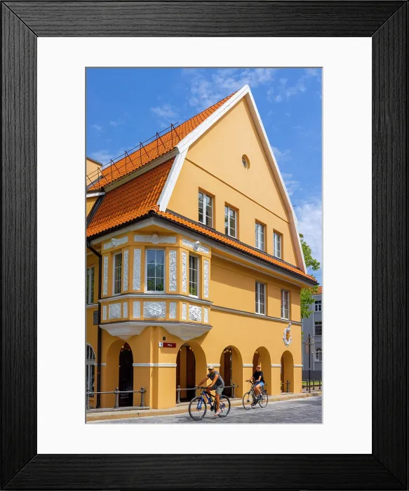 Framed Print : Cyclists infront of Traditional Buildings, Klaipeda, Lithuania
