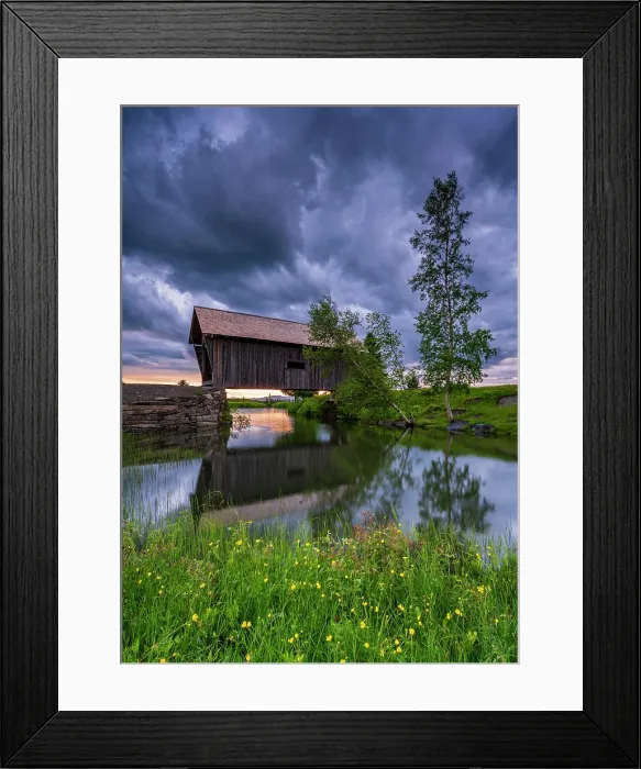 Framed Print : Dark clouds over the A.M. Foster Bridge with Buttercup flowers, Green Mountains, Cabot, Vermont, USA Framed Print : Dark clouds over the A.M. Foster Bridge with Buttercup flowers, Green Mountains, Cabot, Vermont, USA