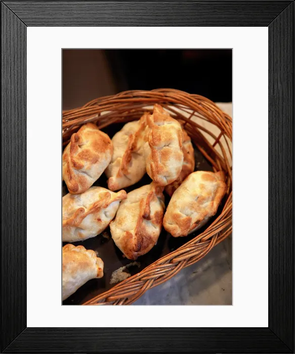 Framed Print : Traditional empanadas on sale in a stand of the San Telmo Market (Spanish: Mercado de San Telmo), Buenos Aires, Argentina Framed Print : Traditional empanadas on sale in a stand of the San Telmo Market (Spanish: Mercado de San Telmo), Buenos Aires, Argentina