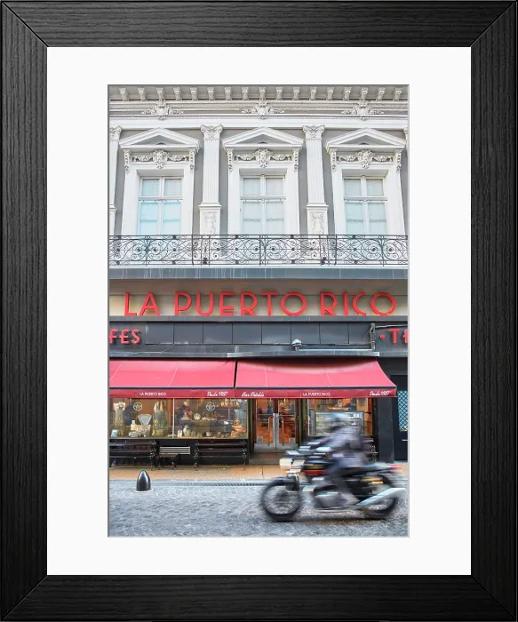 Framed Print : A motorbike passing by the exterior facade of 'La Puerto Rico' Notable Cafe, Monserrat, Buenos Aires, Argentina Framed Print : A motorbike passing by the exterior facade of 'La Puerto Rico' Notable Cafe, Monserrat, Buenos Aires, Argentina