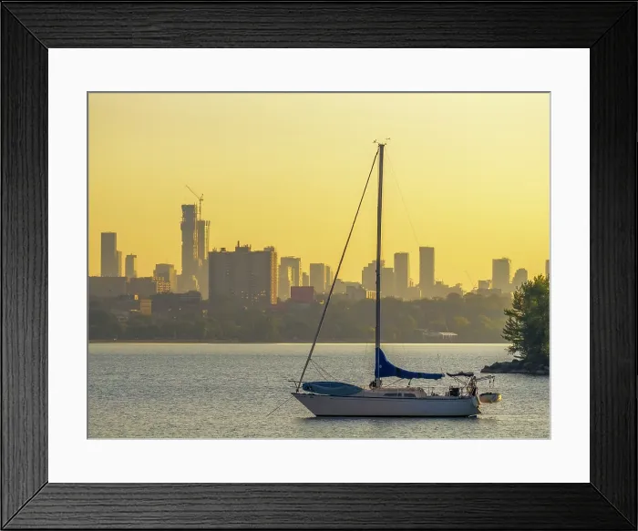 Framed Print : Sailboat anchored in Humber Bay on Lake Ontario in Toronto, Ontario, Canada Framed Print : Sailboat anchored in Humber Bay on Lake Ontario in Toronto, Ontario, Canada
