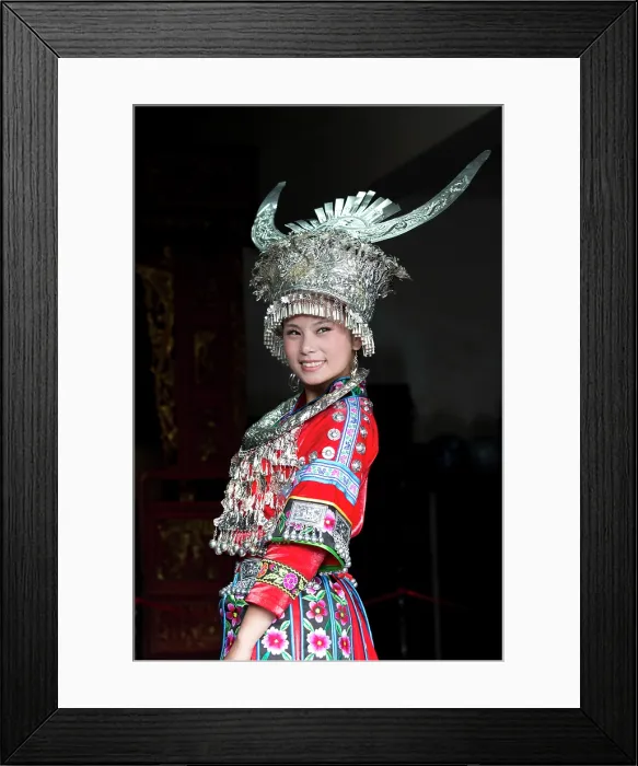 Framed Print : China, Guizhou, a woman wears a traditional Miao costume Framed Print : China, Guizhou, a woman wears a traditional Miao costume