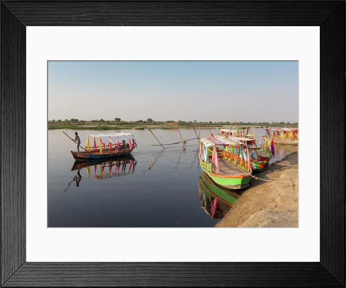 Framed Print : India, Uttar Pradesh, Vrindavan, Colourful boats on the Yamuna river Framed Print : India, Uttar Pradesh, Vrindavan, Colourful boats on the Yamuna river