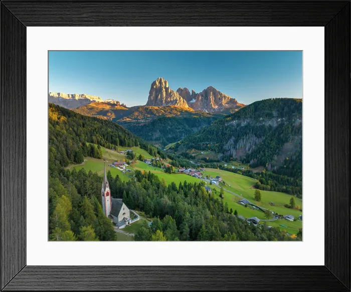 Framed Print : Aerial View over St. Jacob Church with Sassolungo Mountain in the Background, Ortisei - St. Ulrich, Trentino Alto Adige, Dolomites, Italy Framed Print : Aerial View over St. Jacob Church with Sassolungo Mountain in the Background, Ortisei - St. Ulrich, Trentino Alto Adige, Dolomites, Italy