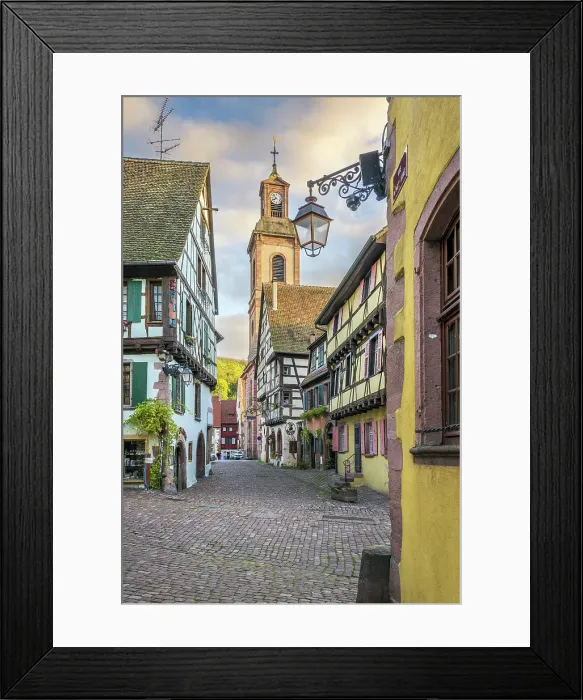 Framed Print : Picturesque street with traditional half-timbered houses, Riquewihr, Haut-Rhin, Alsace, Grand Est, France Framed Print : Picturesque street with traditional half-timbered houses, Riquewihr, Haut-Rhin, Alsace, Grand Est, France