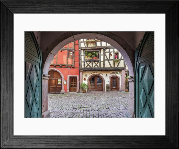 Framed Print : Picturesque street with traditional half-timbered houses, Riquewihr, Haut-Rhin, Alsace, Grand Est, France Framed Print : Picturesque street with traditional half-timbered houses, Riquewihr, Haut-Rhin, Alsace, Grand Est, France
