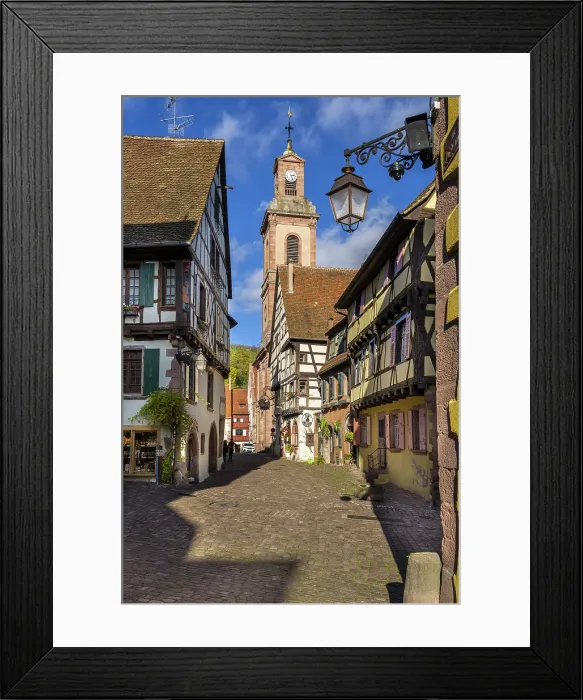Framed Print : Picturesque street with traditional half-timbered houses, Riquewihr, Haut-Rhin, Alsace, Grand Est, France