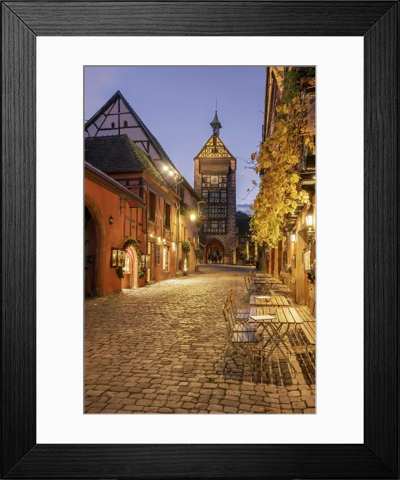 Framed Print : Main street with traditional half-timbered houses and Dolder watchtower, Riquewihr, Haut-Rhin, Alsace, Grand Est, France Framed Print : Main street with traditional half-timbered houses and Dolder watchtower, Riquewihr, Haut-Rhin, Alsace, Grand Est, France