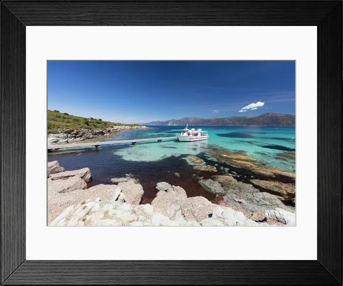 Framed Print : Europe, France Corsica, Haute-Corse excursion boat at Loto beach in the Deserte des Agriates Framed Print : Europe, France Corsica, Haute-Corse excursion boat at Loto beach in the Deserte des Agriates