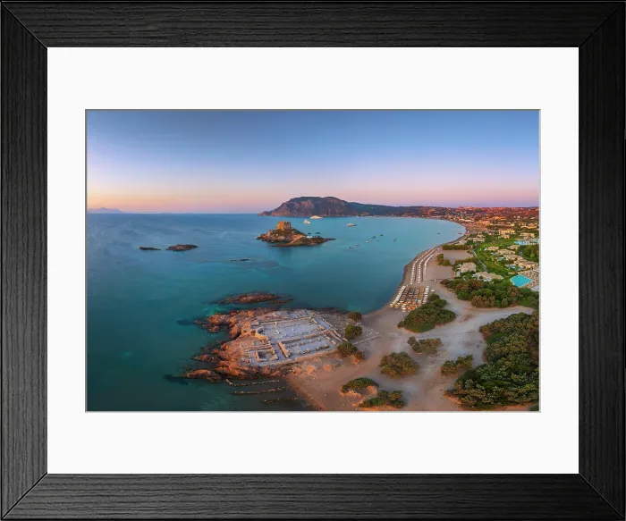 Framed Print : Greece, Dodecanese, Kos Island, Kamari Bay, Agios Stefanos Beach, Saint Stefanos Basilica Ruins and Kastri Island at sunset Framed Print : Greece, Dodecanese, Kos Island, Kamari Bay, Agios Stefanos Beach, Saint Stefanos Basilica Ruins and Kastri Island at sunset