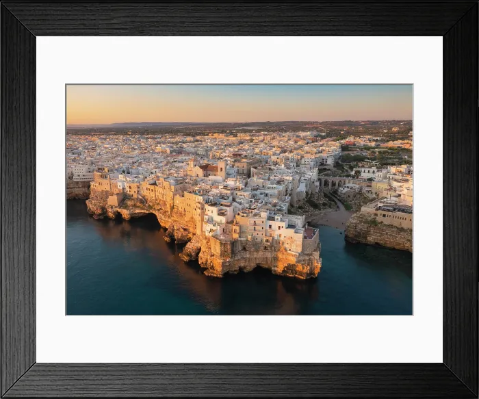 Framed Print : Aerial view of Polignano a mare at sunrise. Bari province, Apulia, Italy Framed Print : Aerial view of Polignano a mare at sunrise. Bari province, Apulia, Italy