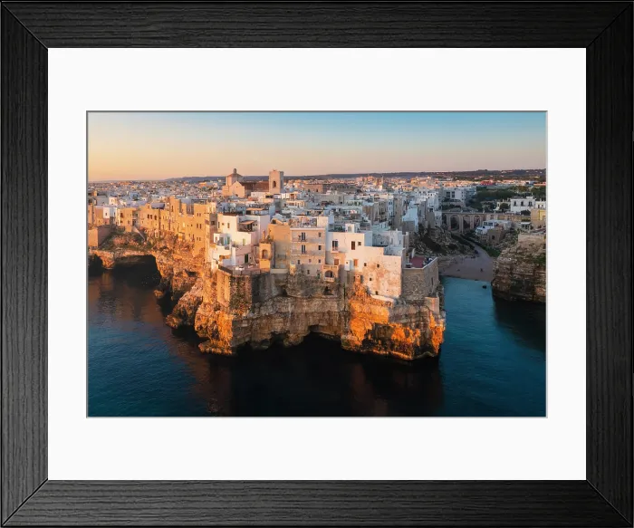 Framed Print : Aerial view of Polignano a mare at sunrise. Bari province, Apulia, Italy Framed Print : Aerial view of Polignano a mare at sunrise. Bari province, Apulia, Italy