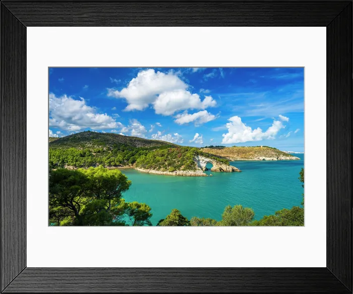 Framed Print : Europe, Italy, Apulia. The view towards a rock arch near to Vieste on the Gargano Peninsula Framed Print : Europe, Italy, Apulia. The view towards a rock arch near to Vieste on the Gargano Peninsula