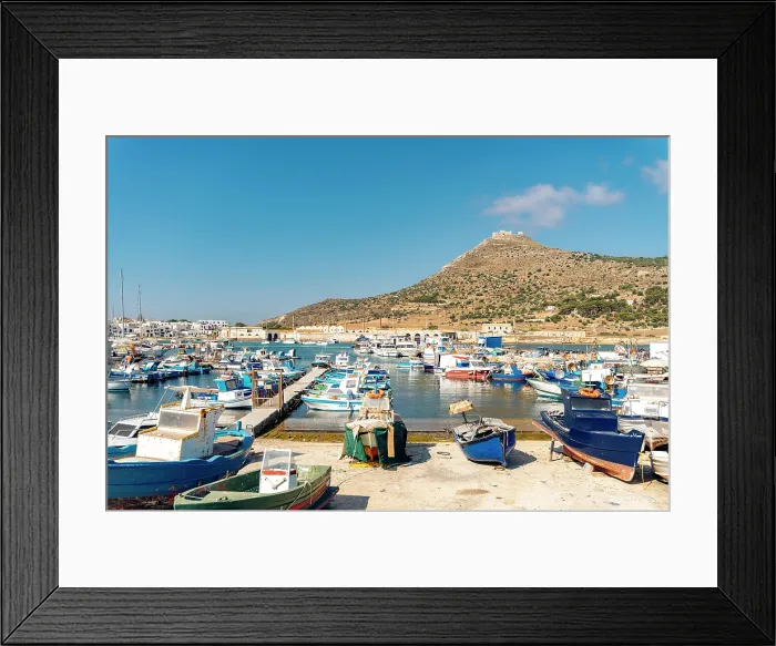 Framed Print : Favignana, Sicily, Italy. Fishing boats in harbor with castle on hill Framed Print : Favignana, Sicily, Italy. Fishing boats in harbor with castle on hill