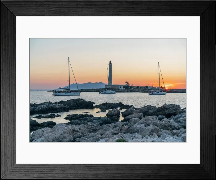 Framed Print : Favignana, Sicily, Italy. Sailboats and lighthouse at sunset
