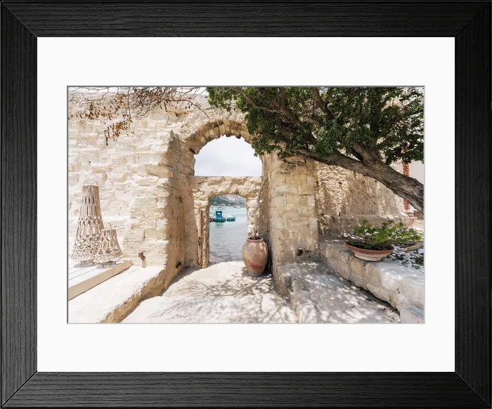 Framed Print : Camparia, Favignana, Italy. Boats in harbor viewed through stone archway Framed Print : Camparia, Favignana, Italy. Boats in harbor viewed through stone archway