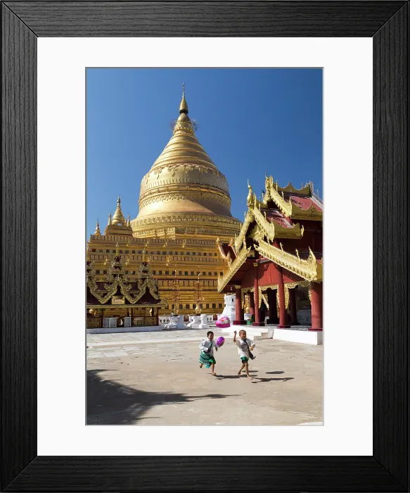Framed Print : Myanmar, Burma, Mandalay, Bagan, Pagan, Shwezigon Pagoda, Boys running with balloons at Shwezigon Paya Framed Print : Myanmar, Burma, Mandalay, Bagan, Pagan, Shwezigon Pagoda, Boys running with balloons at Shwezigon Paya