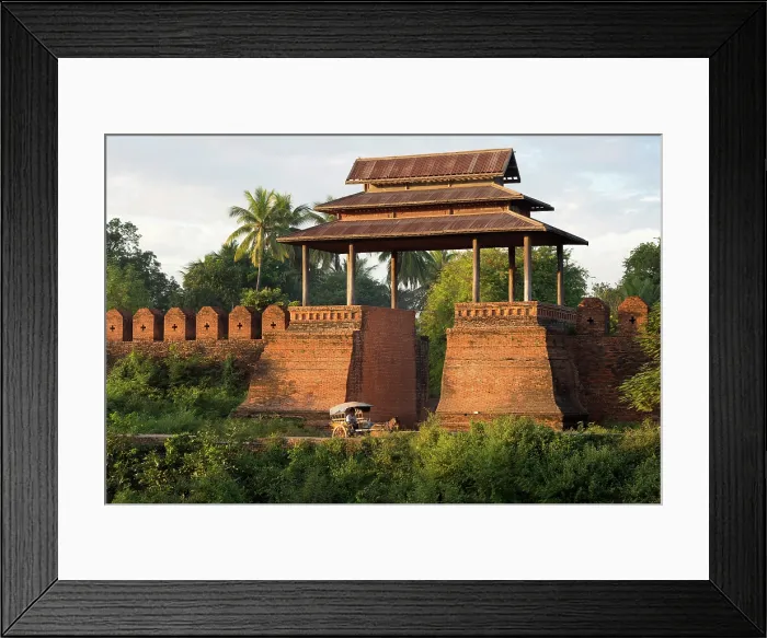 Framed Print : Myanmar, Burma, Mandalay, a carriage passes in front of a brick gate at Inwa Framed Print : Myanmar, Burma, Mandalay, a carriage passes in front of a brick gate at Inwa