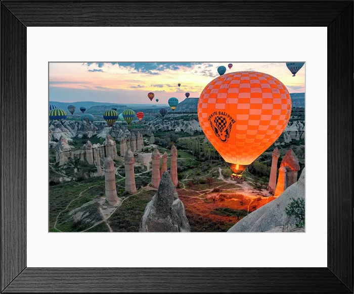Framed Print : Colorful hot air balloons rising over rock formations at sunrise, Love Valley, Goreme National Park, Cappadocia, Central Anatolia, Turkey Framed Print : Colorful hot air balloons rising over rock formations at sunrise, Love Valley, Goreme National Park, Cappadocia, Central Anatolia, Turkey