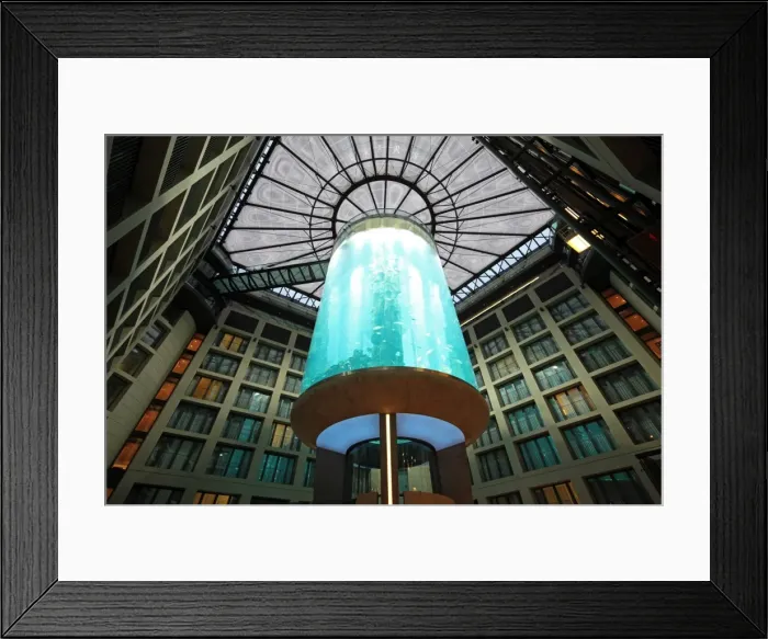 Framed Print : Atrium of the DomAquar e Hotel with a massive aquarium in the middle. Berlin, Germany Framed Print : Atrium of the DomAquar e Hotel with a massive aquarium in the middle. Berlin, Germany