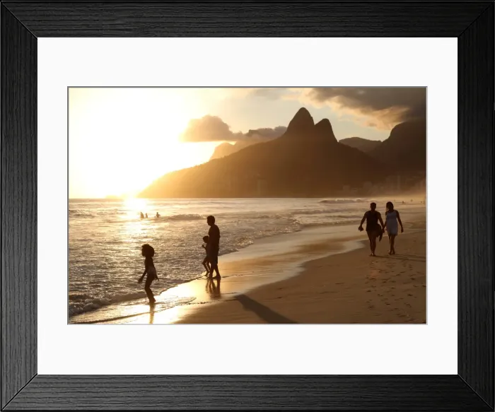 Framed Print : The famous Ipanema Beach in Rio de Janeiro with the Two Brothers Mountain in the background at sunset Framed Print : The famous Ipanema Beach in Rio de Janeiro with the Two Brothers Mountain in the background at sunset