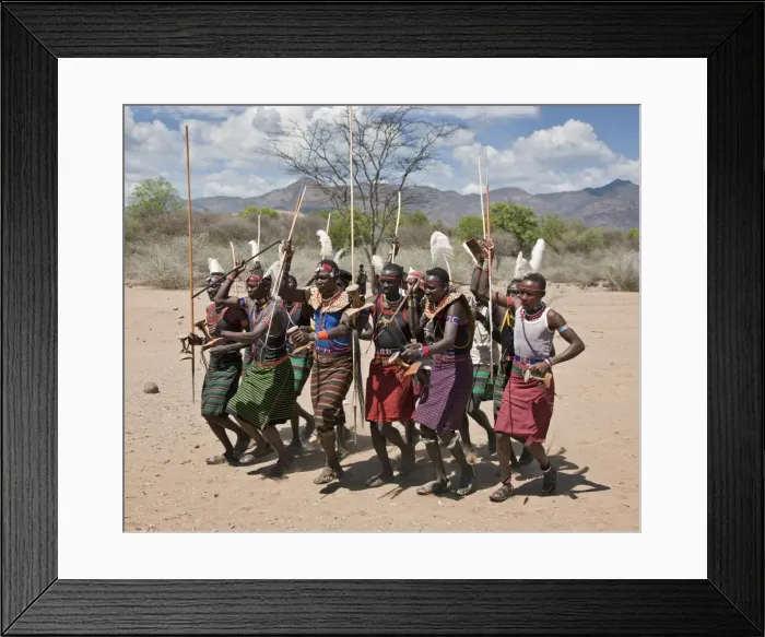 Framed Print : Pokot warriors celebrate an Atelo ceremony. The Pokot are pastoralists speaking a Southern Nilotic language Framed Print : Pokot warriors celebrate an Atelo ceremony. The Pokot are pastoralists speaking a Southern Nilotic language