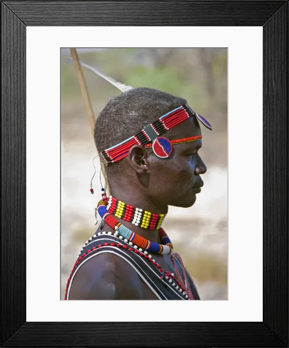 Framed Print : A Pokot man wearing typical beaded ornaments of his tribe. The Pokot are pastoralists speaking a Southern Nilotic Framed Print : A Pokot man wearing typical beaded ornaments of his tribe. The Pokot are pastoralists speaking a Southern Nilotic