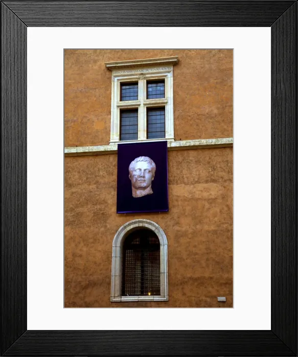 Framed Print : Rome, Italy; A Roman statue advertised on the walls of Palazzo Venezia Framed Print : Rome, Italy; A Roman statue advertised on the walls of Palazzo Venezia