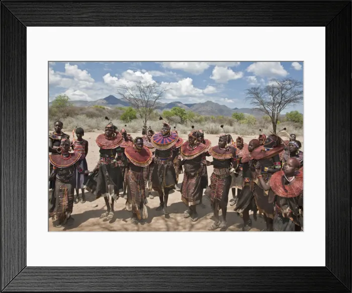 Framed Print : Pokot women and girls dancing to celebrate an Atelo ceremony. The Pokot are pastoralists speaking a Southern Framed Print : Pokot women and girls dancing to celebrate an Atelo ceremony. The Pokot are pastoralists speaking a Southern