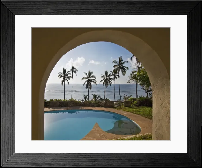 Framed Print : The view from Chingwede House, a beautiful coast house built on a cliff overlooking the coconut palm-fringed Msambweni beach, south of Mombasa, and the Indian Framed Print : The view from Chingwede House, a beautiful coast house built on a cliff overlooking the coconut palm-fringed Msambweni beach, south of Mombasa, and the Indian