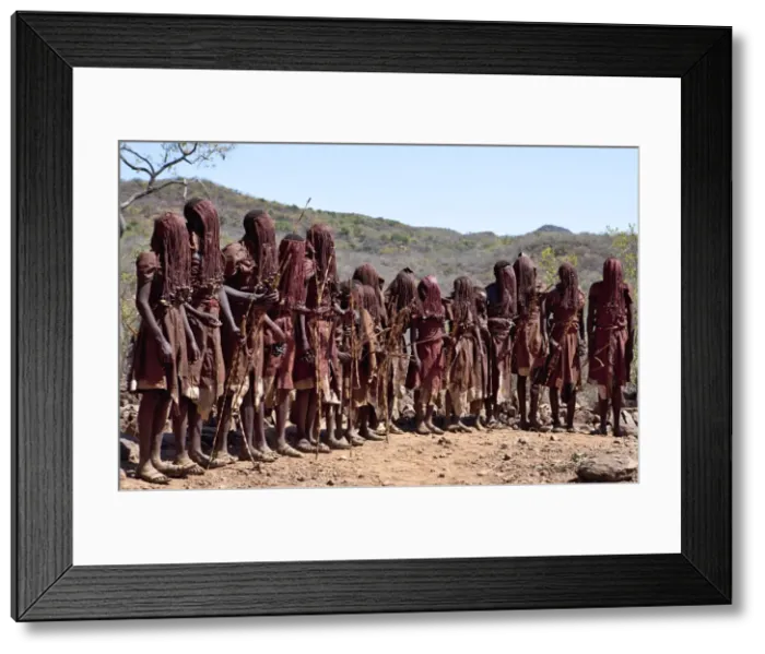 Framed Print : For two to three months after their circumcision, Pokot boys sing and dance in a special seclusion camp while undergoing instruction from tribal elders. During this time, they must wear goatskins, conceal their faces with masks made from Framed Print : For two to three months after their circumcision, Pokot boys sing and dance in a special seclusion camp while undergoing instruction from tribal elders. During this time, they must wear goatskins, conceal their faces with masks made from