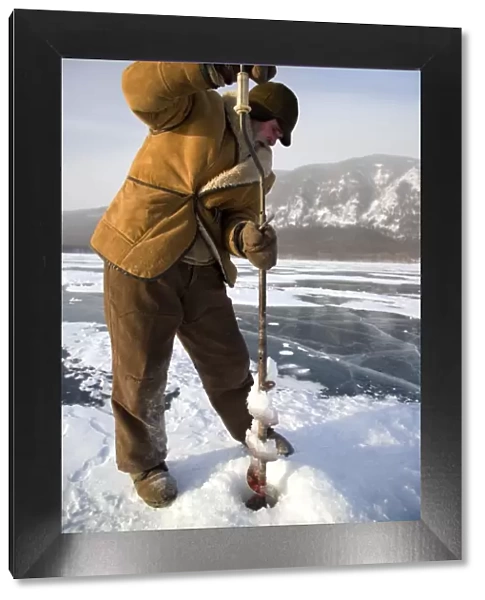 Russia, Siberia, Baikal; Undergoing preparations for fishing on frozen lake baikal in winter