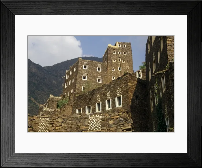 Framed Print : Saudi Arabia, Asir, Rejal- al-amaa. Standing in the Asir Mountains and recently part-restored