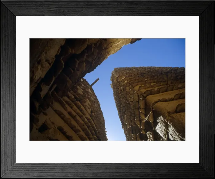 Framed Print : Saudi Arabia, Asir, Al-Alkhalaf. The village of Al-Alkhalaf is among the finest examples of the regions traditional forms of architecture (sometimes called raqaf) with tower-like houses with adobe walls (khulb) protected from erosion Framed Print : Saudi Arabia, Asir, Al-Alkhalaf. The village of Al-Alkhalaf is among the finest examples of the regions traditional forms of architecture (sometimes called raqaf) with tower-like houses with adobe walls (khulb) protected from erosion