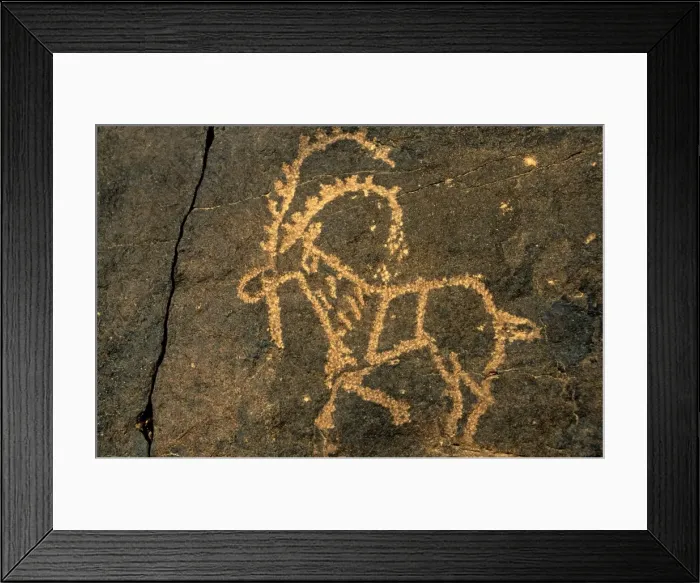 Framed Print : Saudi Arabia, Najran, Bir Hima. One of the countrys most important rock art sites is remote Bir Hima where hundreds of petroglyphs have been incised in cliffs Framed Print : Saudi Arabia, Najran, Bir Hima. One of the countrys most important rock art sites is remote Bir Hima where hundreds of petroglyphs have been incised in cliffs