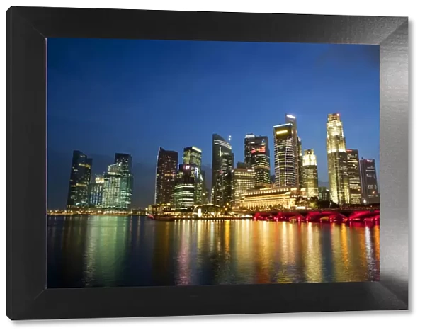 Singapore, Singapore, Marina Bay. The central business district skyline at dusk