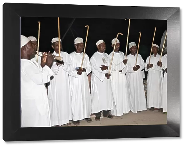 Kenya. The Swahili elite, Wangwana, perform the traditional stick dance during Maulidi, celebration of Prophet Mohammeds birthday