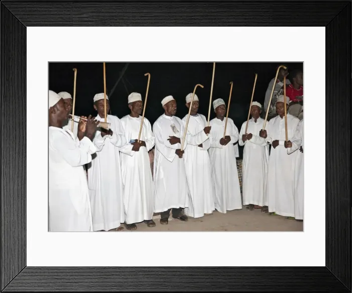 Framed Print : Kenya. The Swahili elite, Wangwana, perform the traditional stick dance during Maulidi, celebration of Prophet Mohammeds birthday