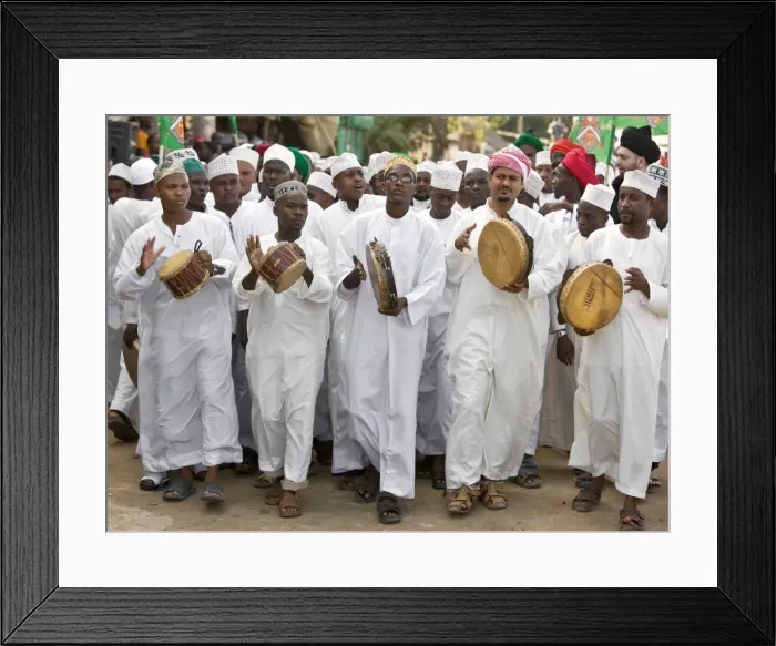 Framed Print : Kenya. A joyful Muslim procession during Maulidi, the celebration of Prophet Mohammeds birthday Framed Print : Kenya. A joyful Muslim procession during Maulidi, the celebration of Prophet Mohammeds birthday