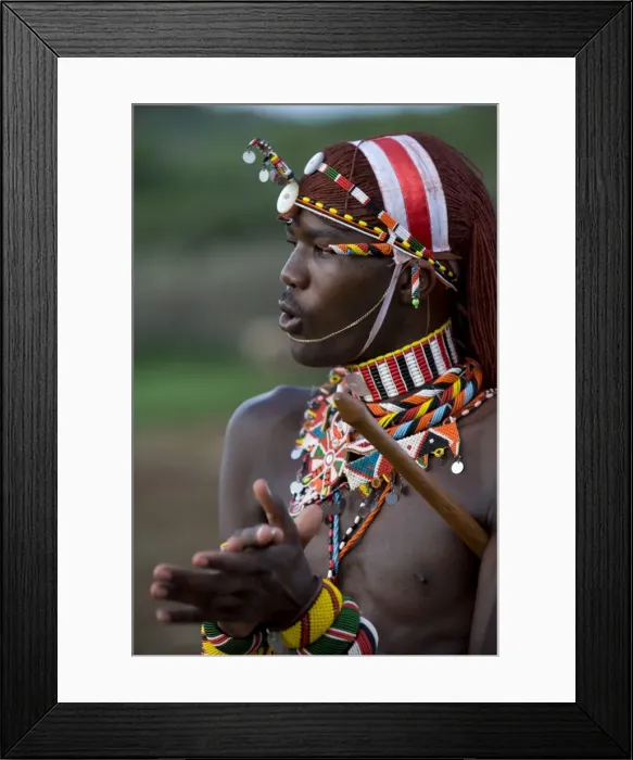 Framed Print : Kenya, Laikipia, Ol Malo. A Samburu warrior sings and claps during a dance
