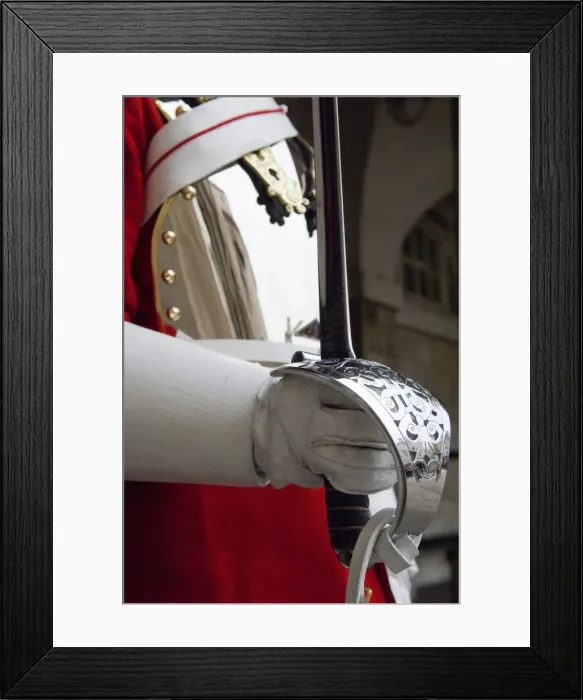 Framed Print : England, London. A Guardsman in the Household Cavalry holding a Ceremonial Sword Framed Print : England, London. A Guardsman in the Household Cavalry holding a Ceremonial Sword