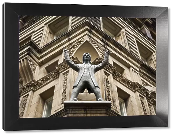England, Liverpool, North John Street, The Hard Days Night Hotel, with George Harrison statue
