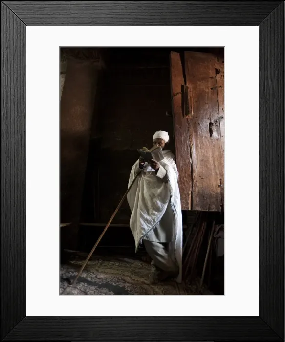 Framed Print : Ethiopia, Lalibela. A priest in one of the ancient rock-hewn churches of Lalibela Framed Print : Ethiopia, Lalibela. A priest in one of the ancient rock-hewn churches of Lalibela