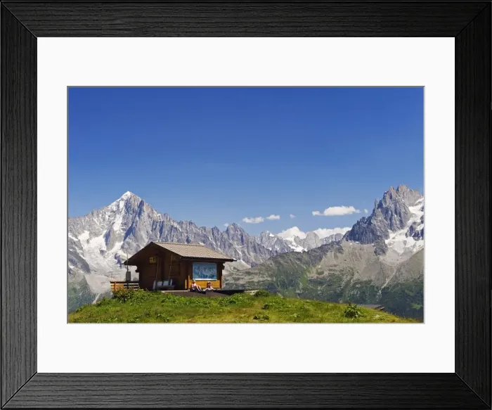 Framed Print : France, Rhone Alps, Chamonix Valley, hikers resting at a mountain hut with Les Dru mountains Framed Print : France, Rhone Alps, Chamonix Valley, hikers resting at a mountain hut with Les Dru mountains