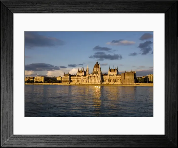 Framed Print : Hungary, Budapest. The Parliament Building by the River Danube, catches the last of the evening sun Framed Print : Hungary, Budapest. The Parliament Building by the River Danube, catches the last of the evening sun