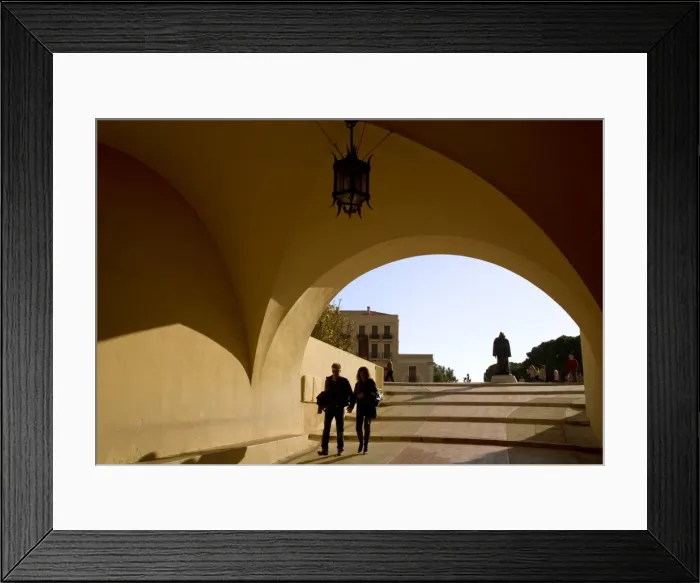 Framed Print : Monaco, Cote D Azur, Monaco Ville; A couple passing through the tunnel leading to the main square in